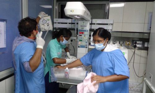 doctors and nurses in patient ward