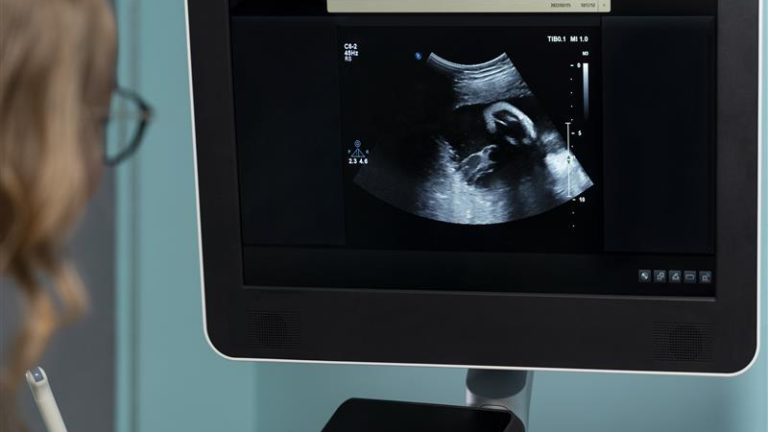 gynecologist-performing-ultrasound-consultation.jpg
